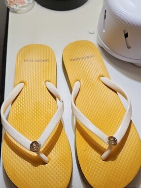 Tory Burch Yellow Flip Flops with White Straps and Gold Logo